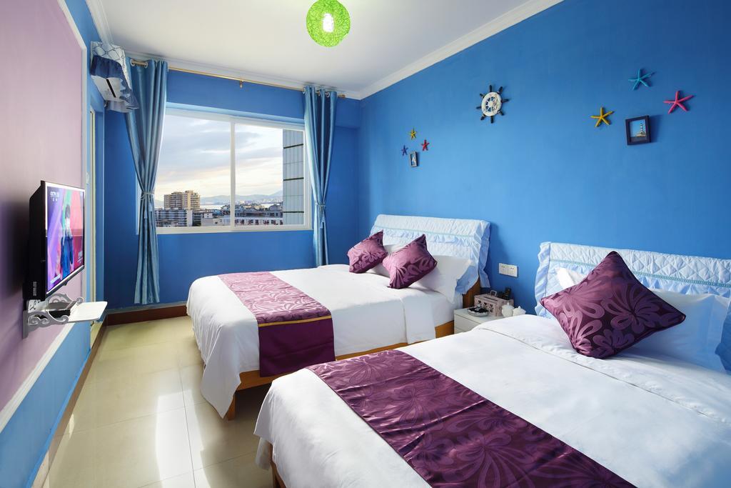 Hantang Holiday House Apartment Sanya Bagian luar foto