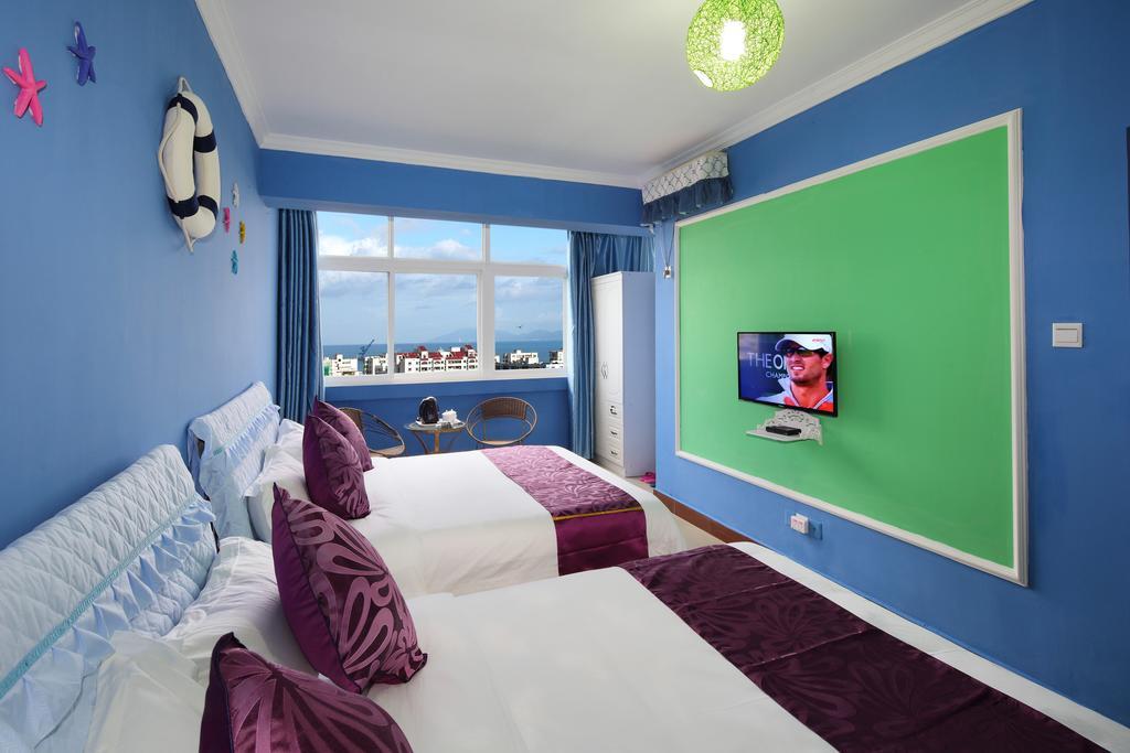 Hantang Holiday House Apartment Sanya Bagian luar foto